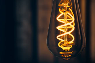 yellow light bulb in close up photography