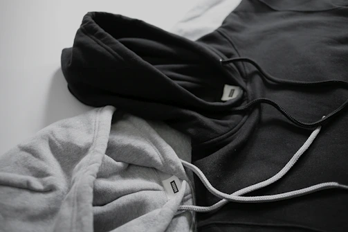 Flat lay of all three hoodie styles together, emphasizing their sensory-friendly fabrics and durable craftsmanship.
