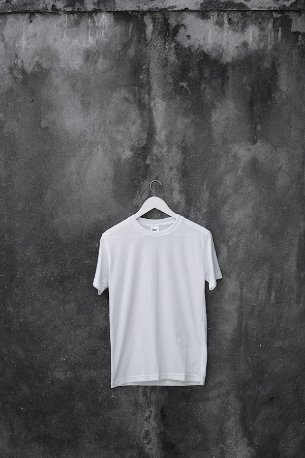 Plain white crew neck t-shirt on neutral background