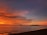 A stunning sunset view over a serene beach in the Philippines.