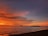 A stunning sunset view over a serene beach in the Philippines.