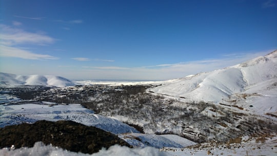 snow covered mountain under blue sky during daytime in رزجرد، Qazvin Province Iran