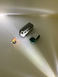 white and green car toy