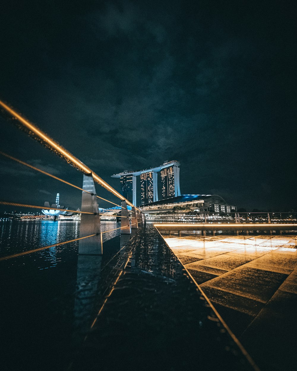 bridge over river during night time