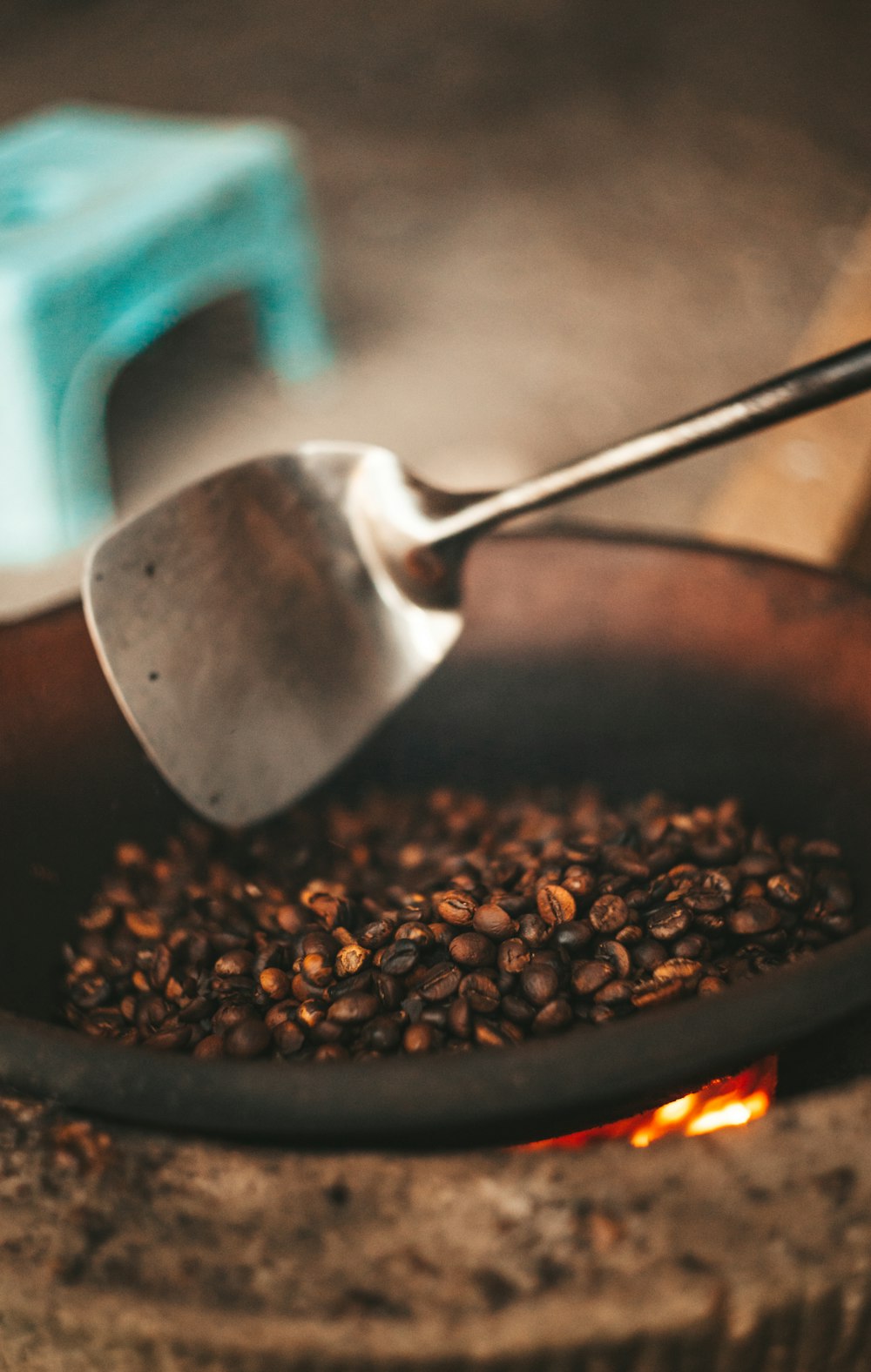 brown beans on black ceramic bowl