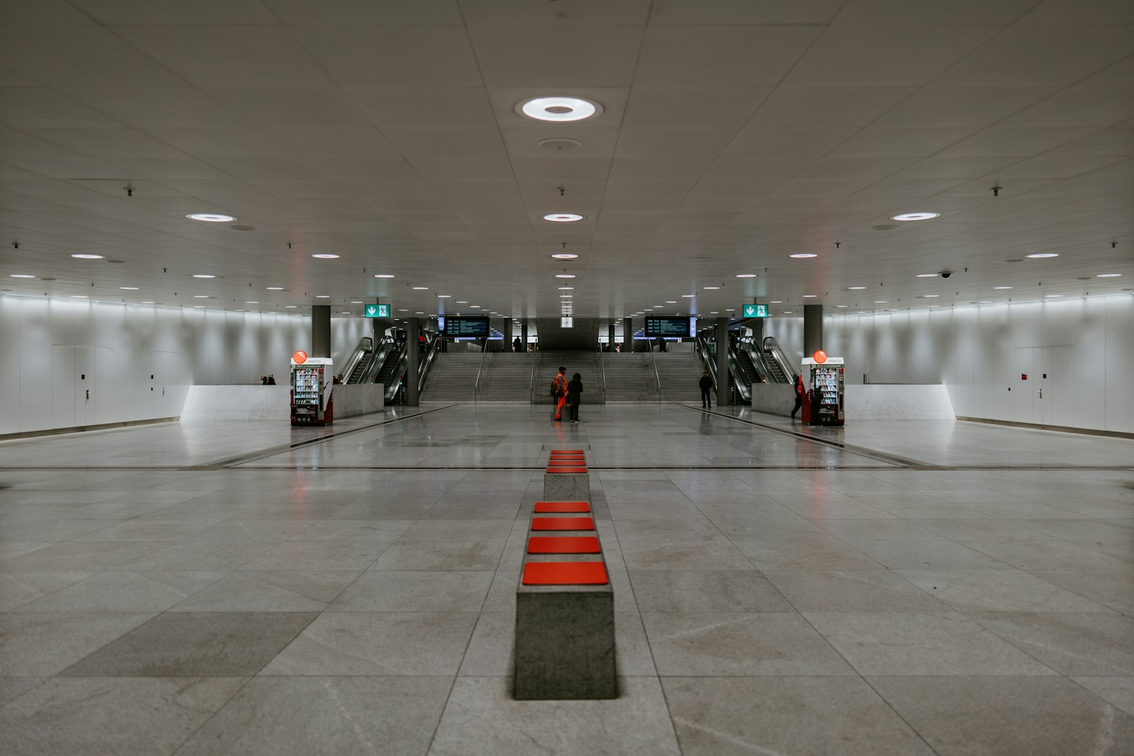 Sony FE 24mm F1.4 GM sample photo. People walking on white photography