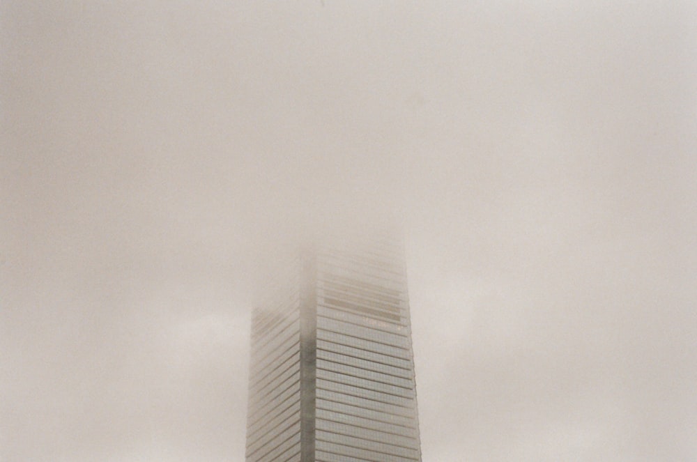 gray high rise building under white sky