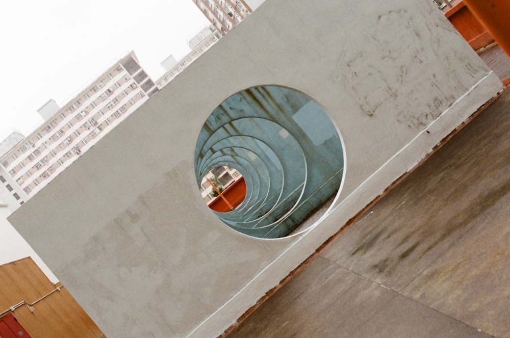 white concrete building with glass window