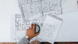 person holding black magnifying glass