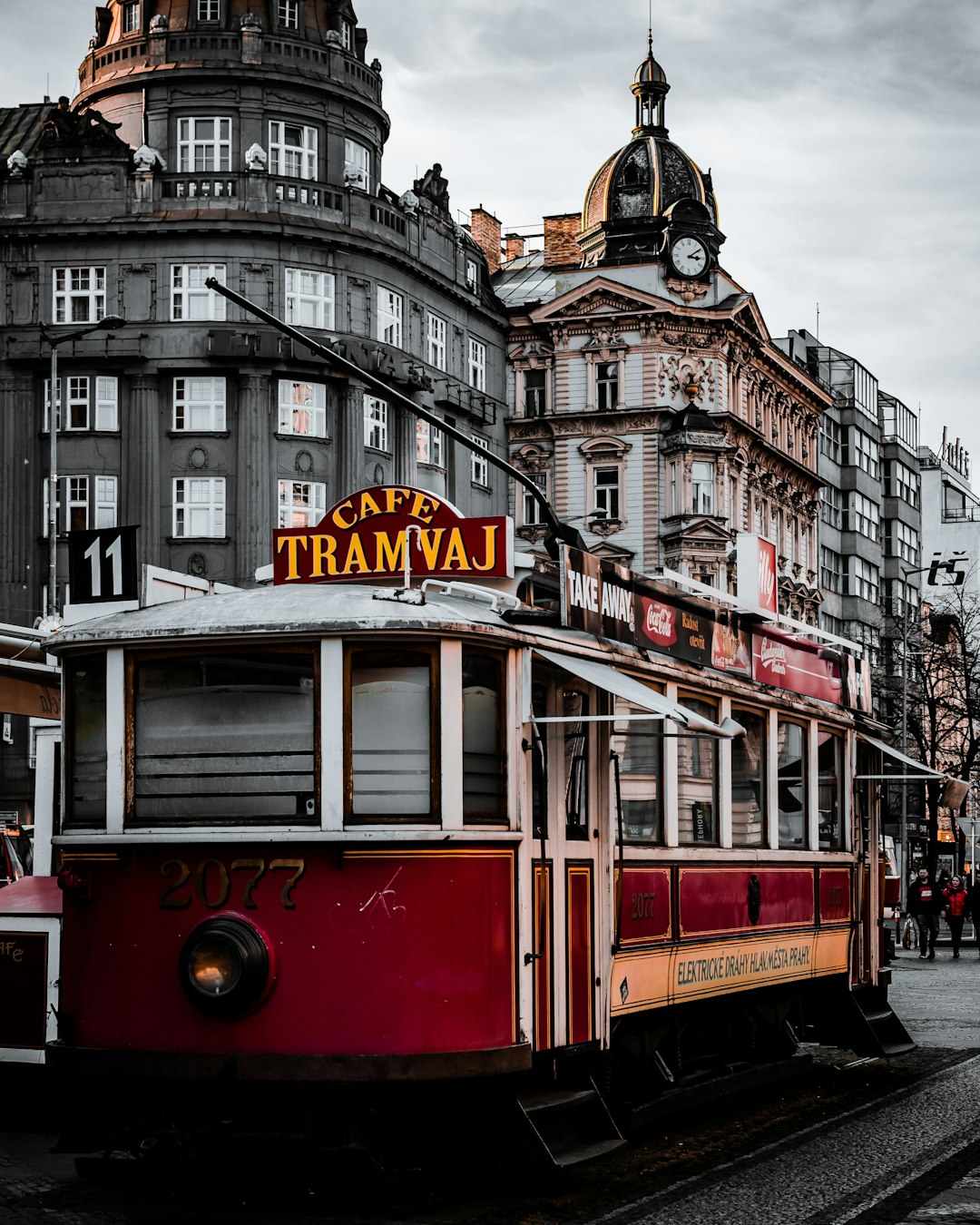 red and white tram on the street