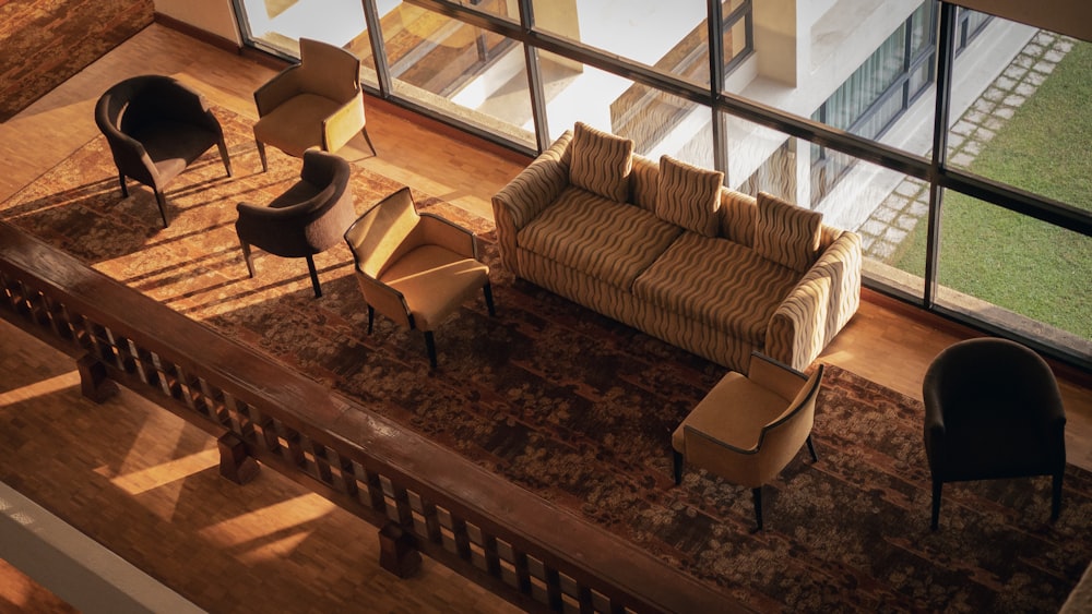 brown wooden table near brown sofa chair