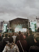 Security personnel coordinating at a large outdoor concert venue