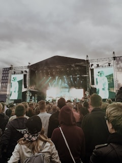 Large outdoor concert crowd enjoying music powered by Rindu Job Entertainment's sound system