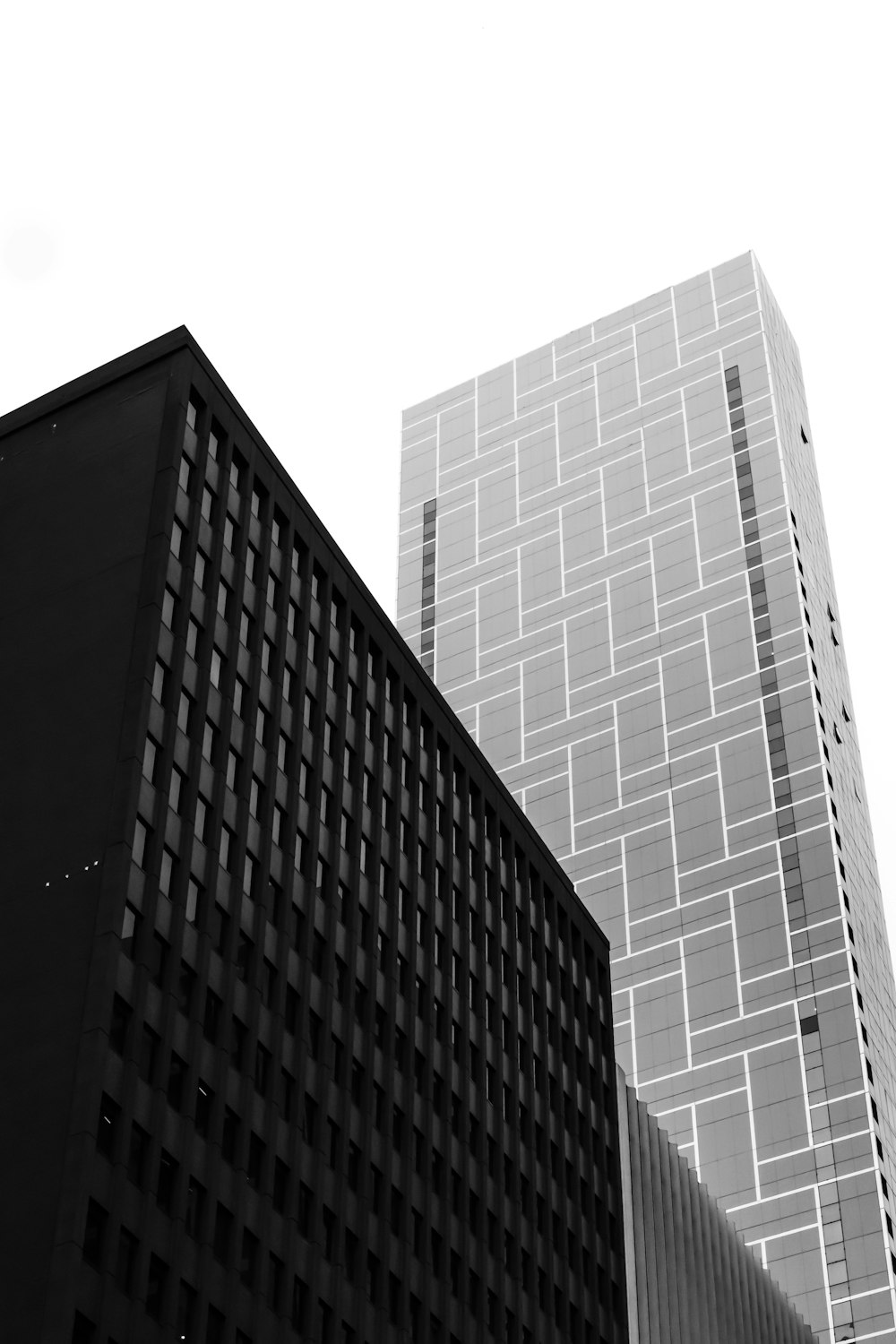 grayscale photo of high rise building