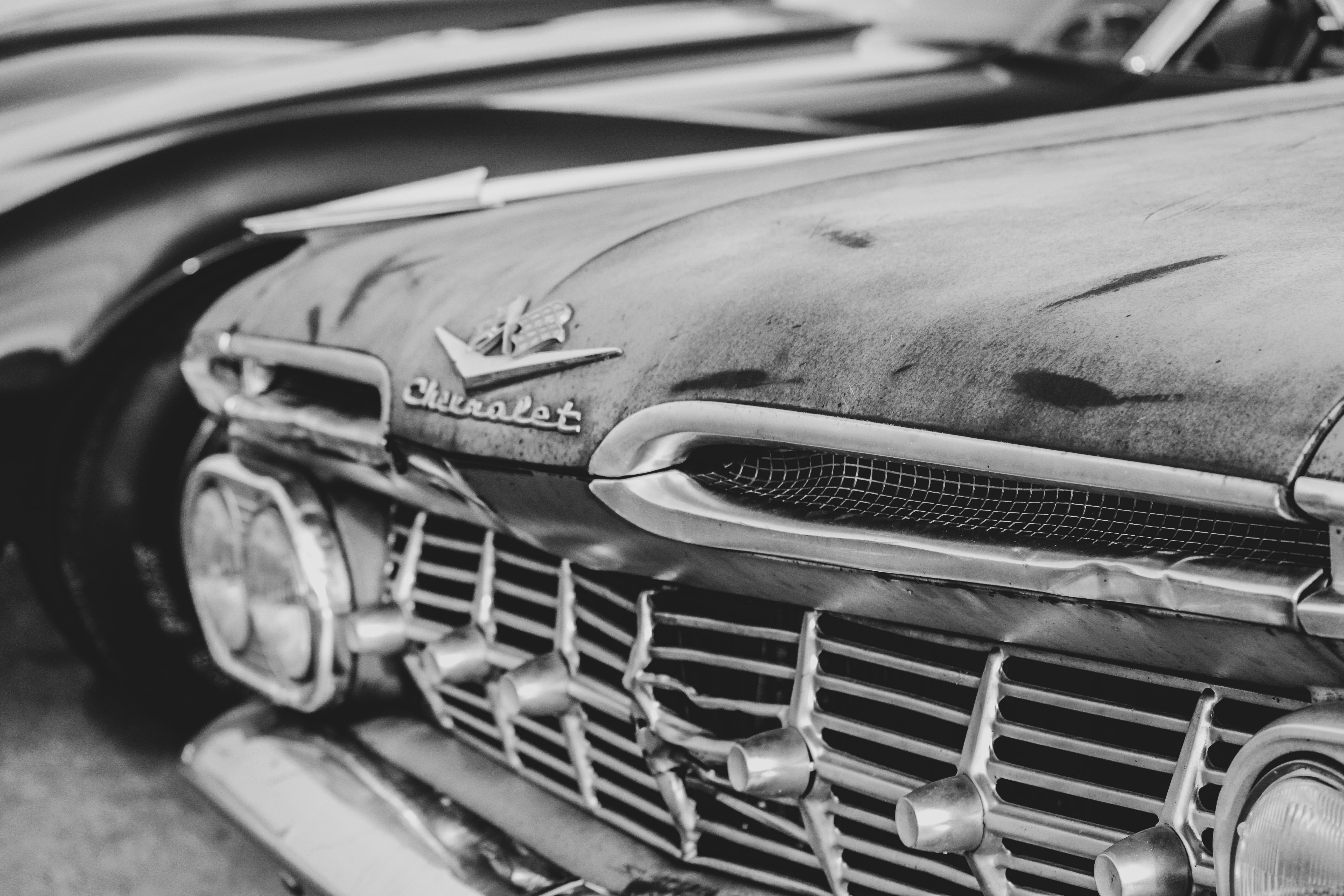 grayscale photo of classic car