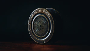 A map and compass resting on a wooden table, hinting at tailored exploration.