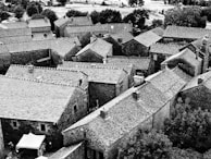 A panoramic view of a historic village with medieval architecture.