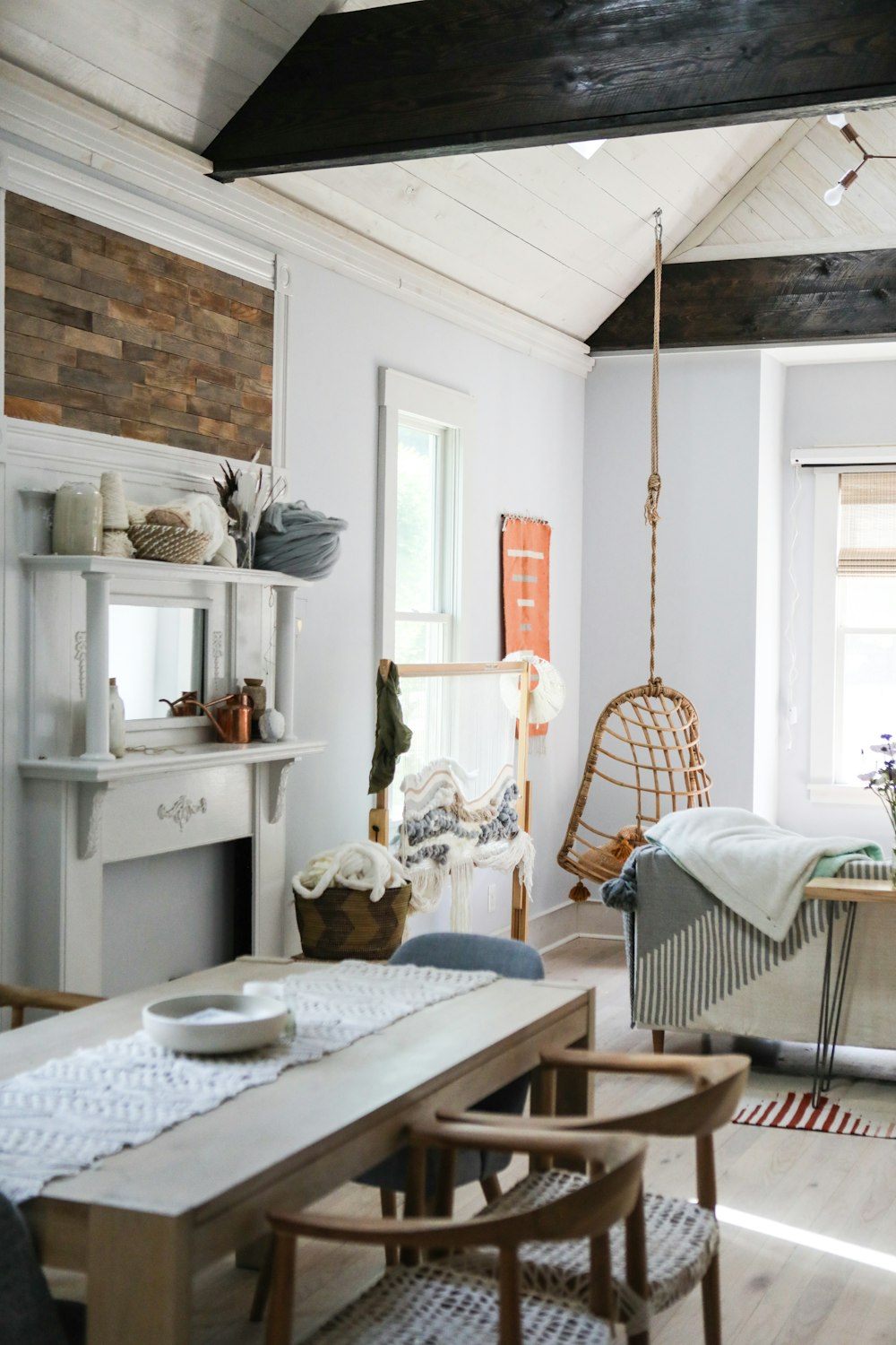 white wooden table near white wooden framed glass window