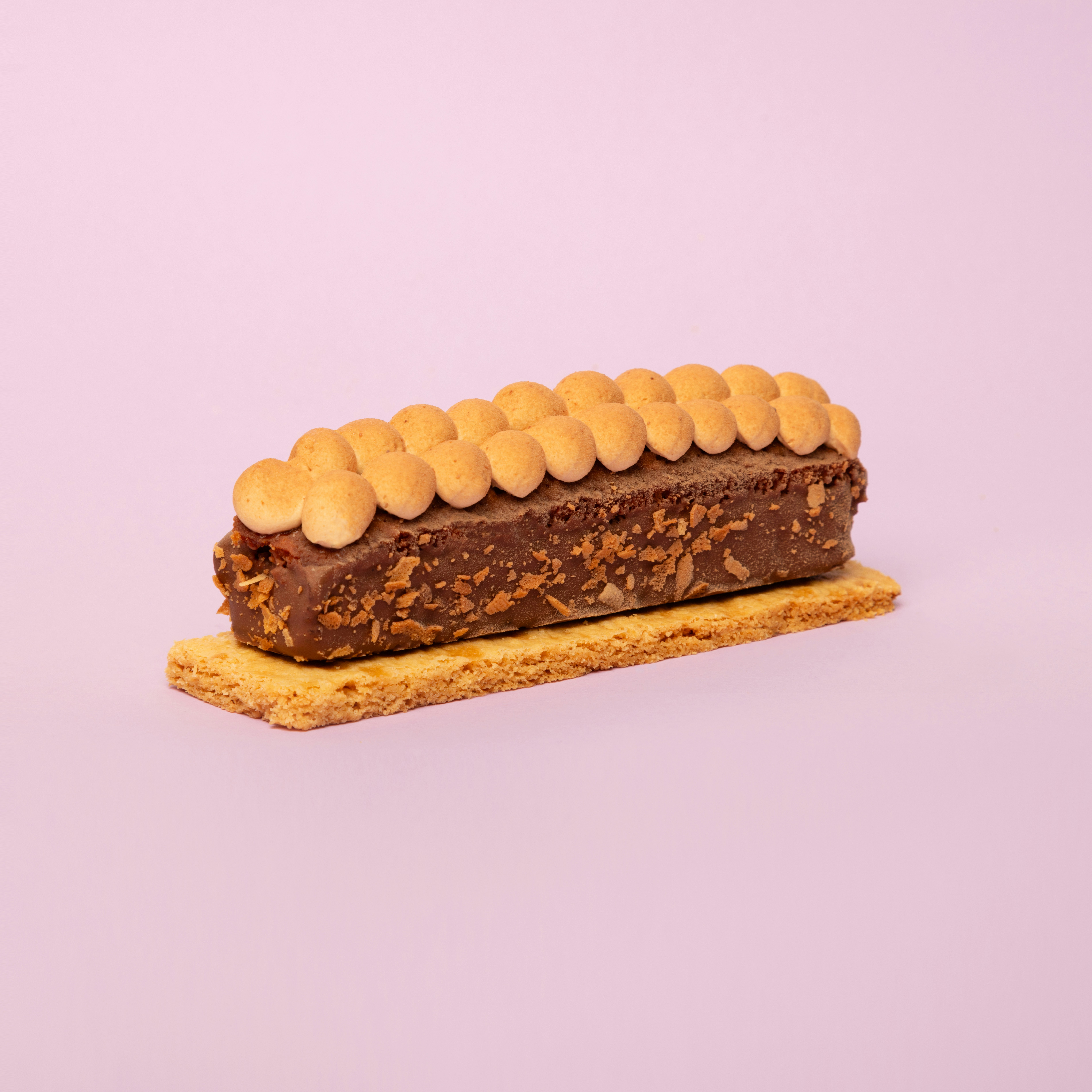 brown and white cookies on white surface