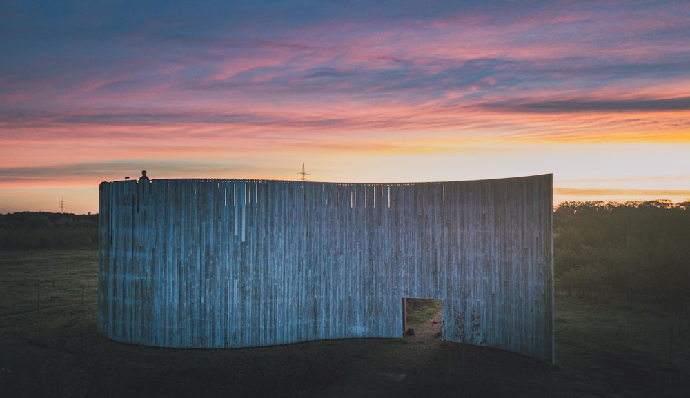 brown wooden fence during sunset