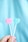 pink heart lollipop on white textile