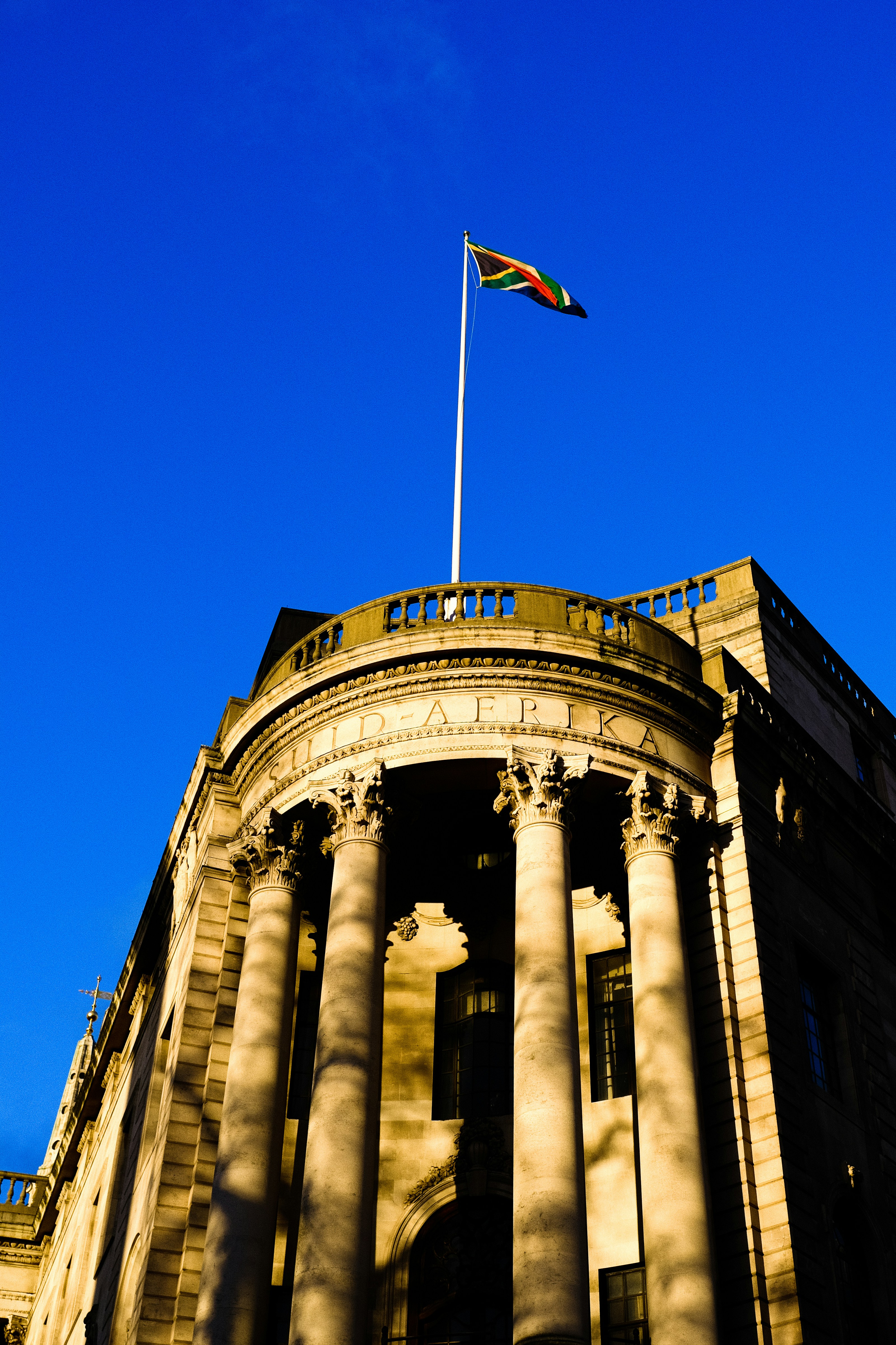 South African parliament building in Cape Town with South African flag