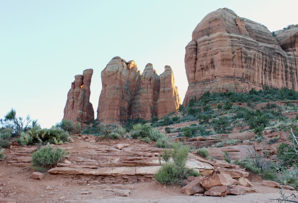 brown rock formation under white sky during daytime