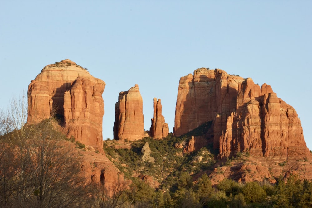 brown rock formation under blue sky during daytime