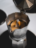 silver and black coffee maker