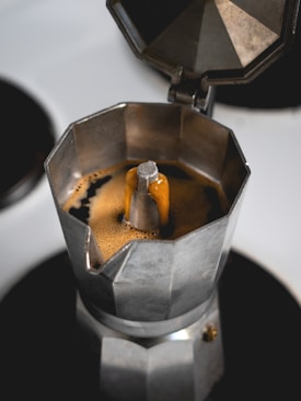silver and black coffee maker