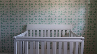 A family practicing safe sleep with a properly set up crib.