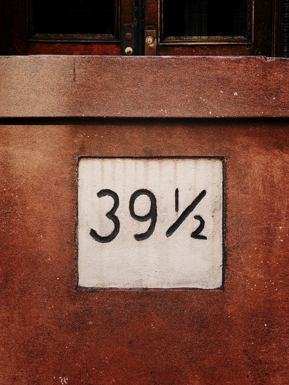 brown wooden door with number 10