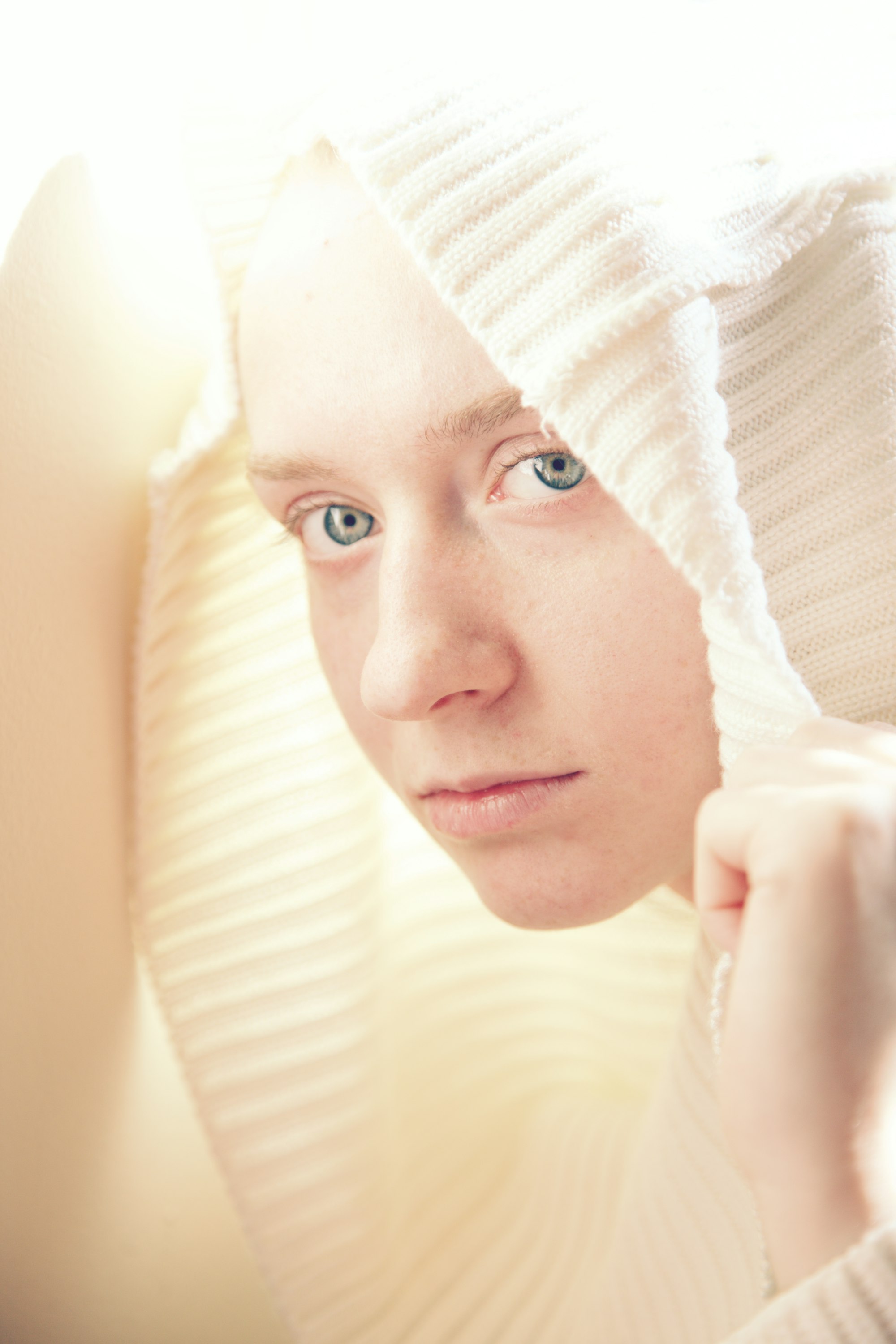 woman in white knit cap