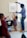 A happy family engaging in a homeschooling activity.