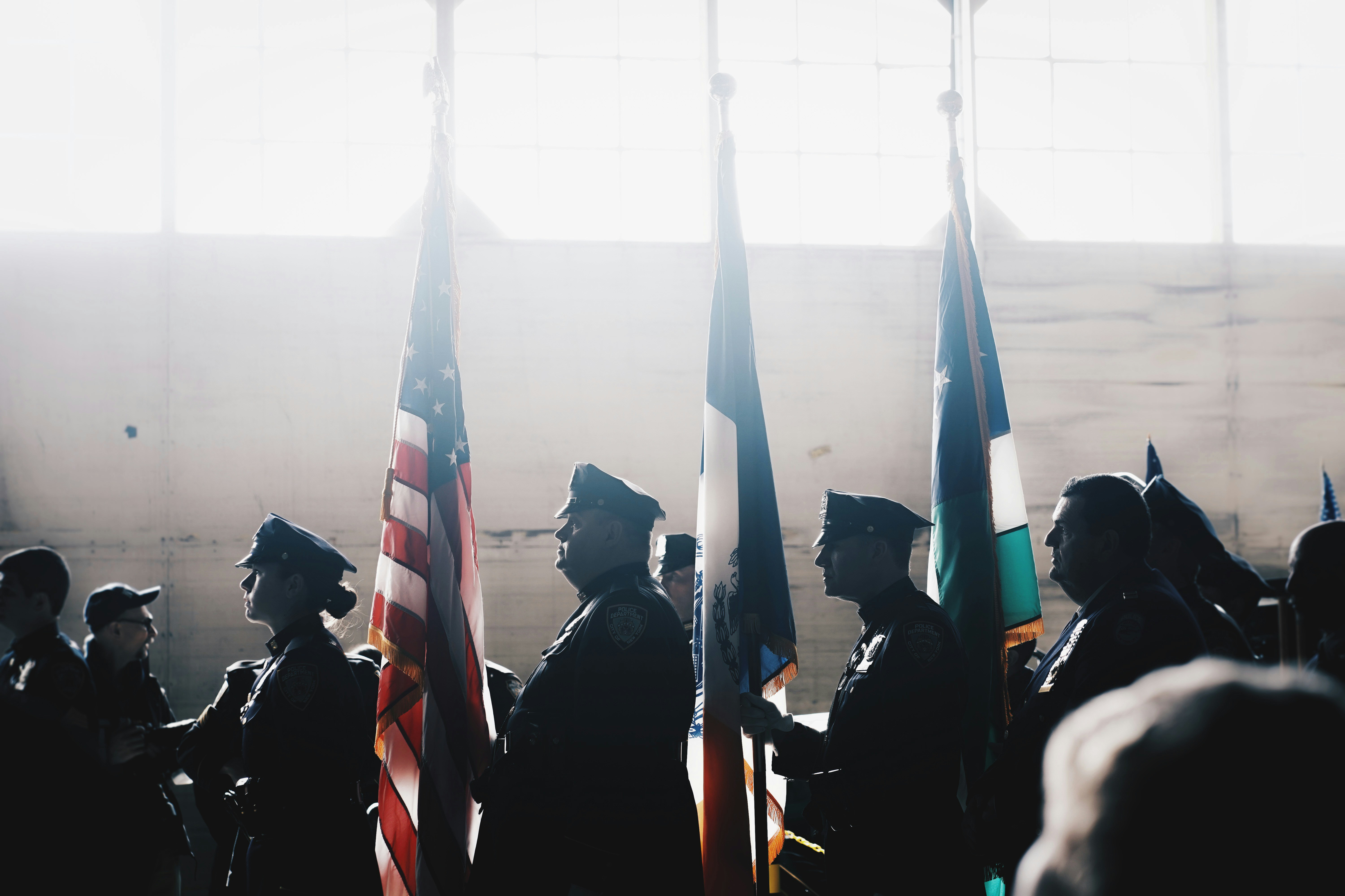 University graduates with flags