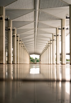 person walking on hallway during daytime