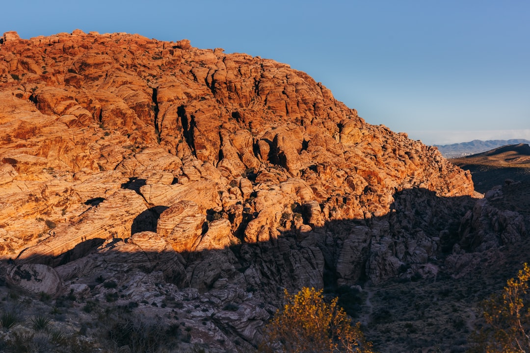 brown rocky mountain under blue sky during daytime