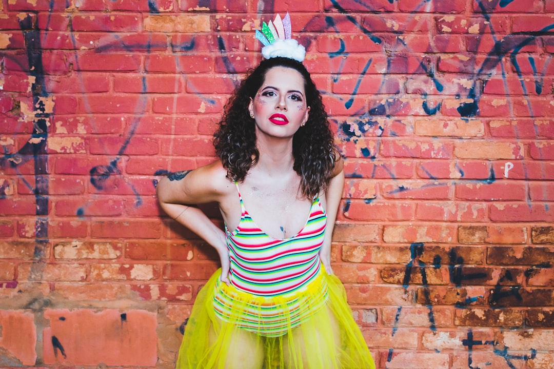 woman in yellow and white striped tank dress