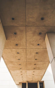 Placeholder image of a sleek, modern drywall installation in a bright commercial space.
