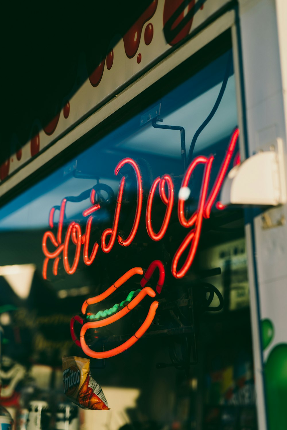 red and white open neon light signage