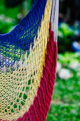Close-up of a compact, ultralight Golite hammock packed tightly in its stuff sack.