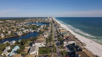 aerial view of city near sea during daytime