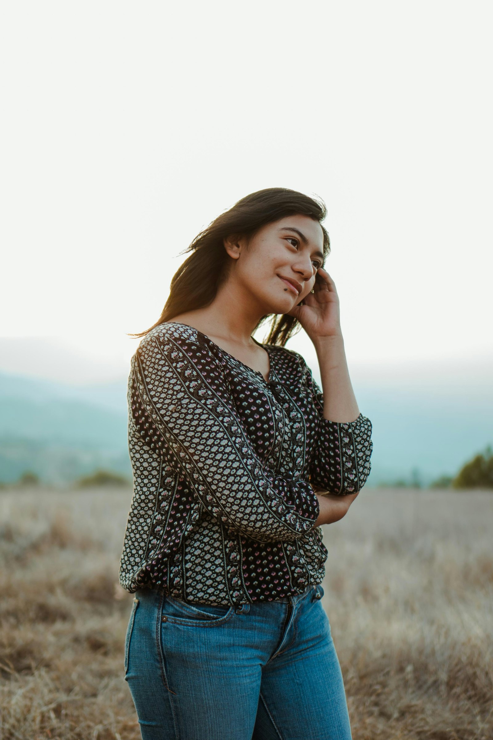 Sony a7 II + Sony E 35mm F1.8 OSS sample photo. Woman in black and photography