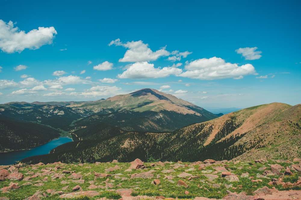 green and brown mountains under blue sky during daytime