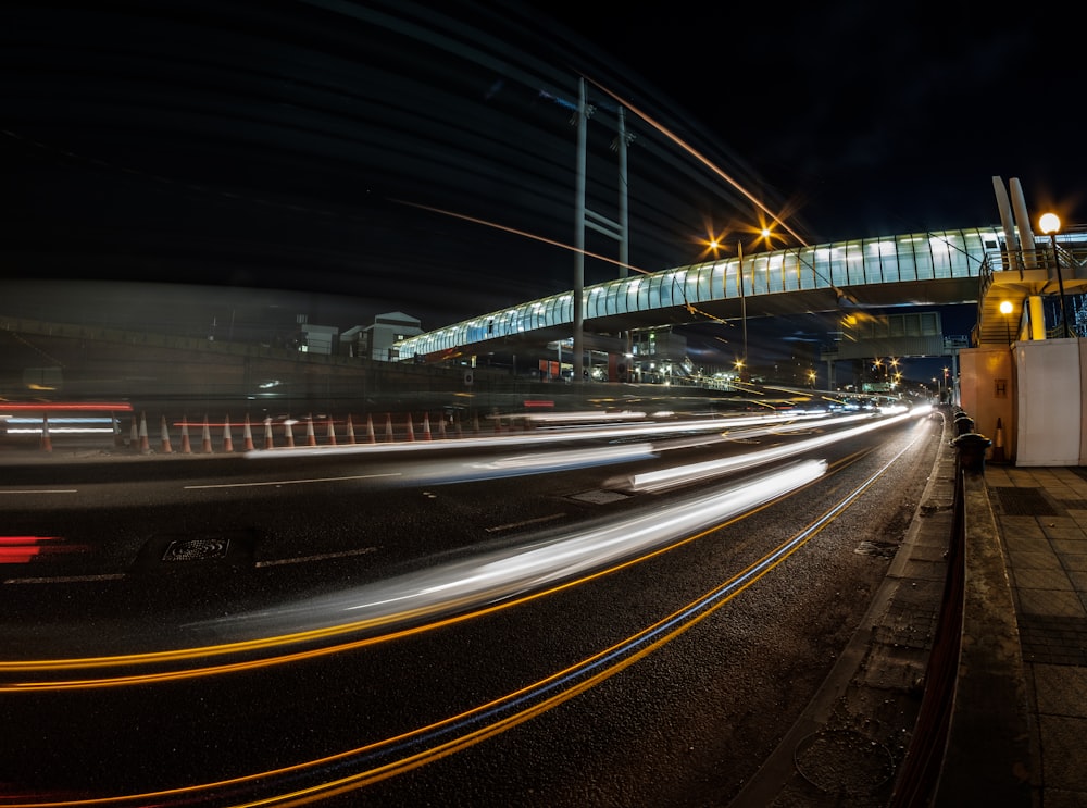 time lapse photography of cars on road during night time