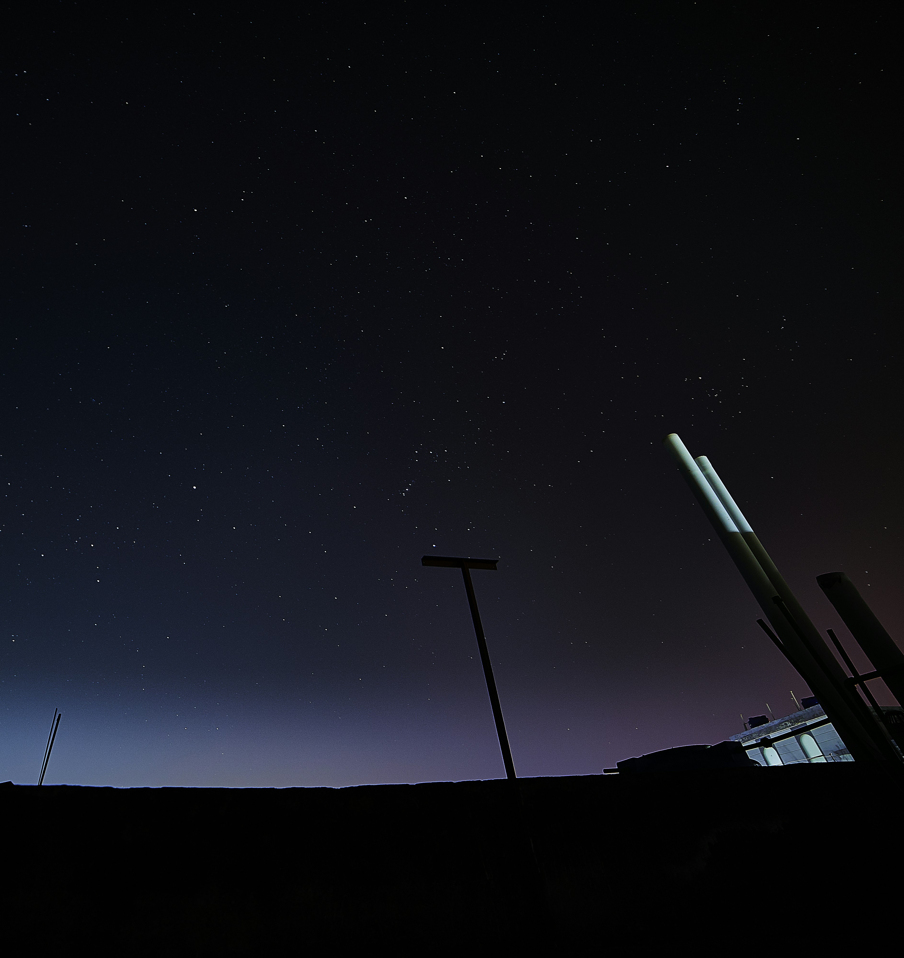 It was a rare clear sky in my city. So I used this opportunity to capture a starry night along with city structures and slight light pollution.

In this picture you can see Orien's belt in center and Siruis star(brighest star in our night sky) on mid-left.