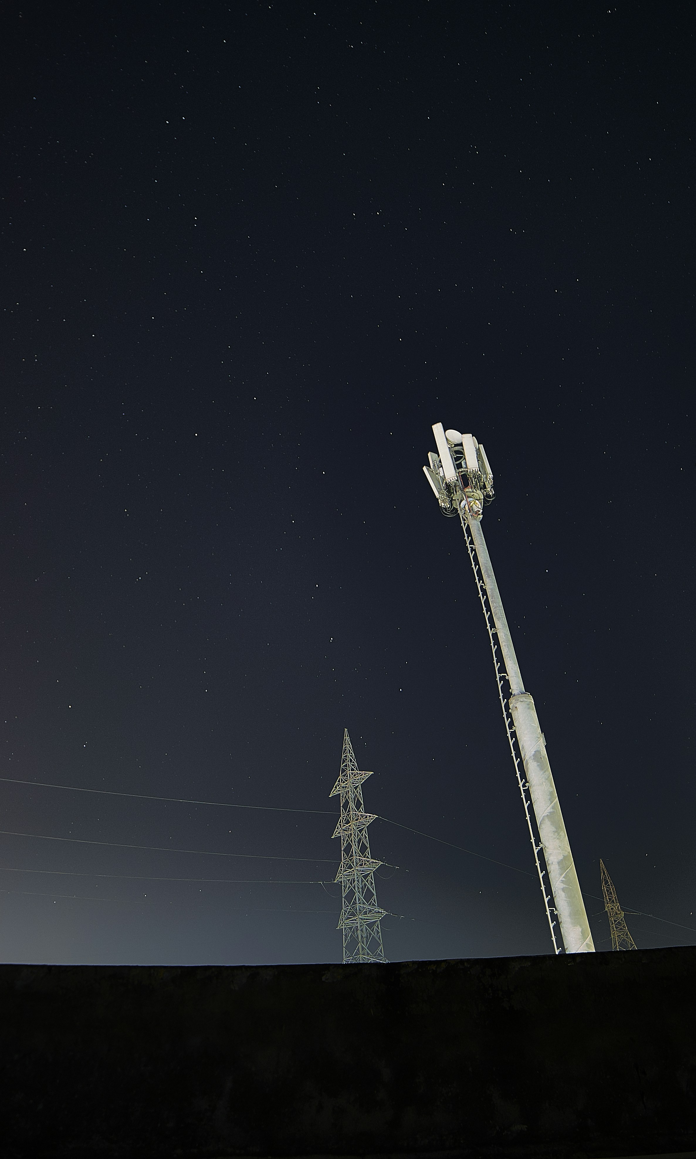It was a rare clear sky in my city. So I used this opportunity to capture a starry night along with city structures and slight light pollution.

In this picture you can see Big Dipper, radio and electricity tower.