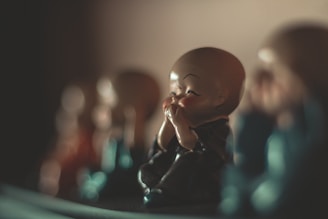 The monk sharing a meal with local villagers, laughter filling the air.