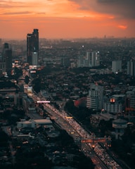 aerial view of city buildings during sunset