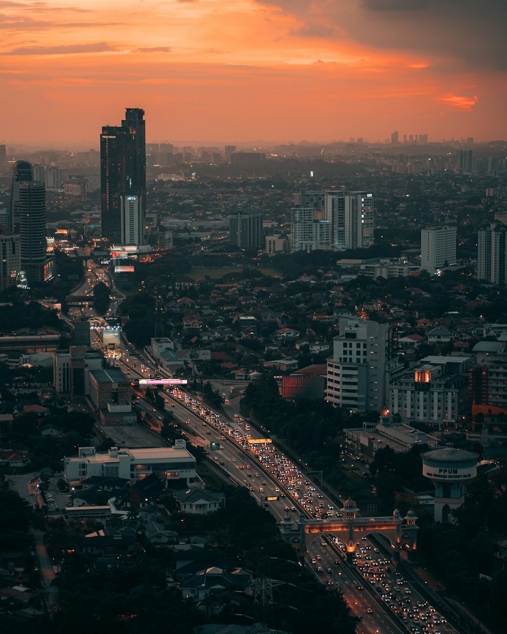 aerial view of city buildings during sunset